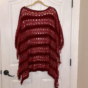 Beautiful crocheted poncho with cranberry and dark burgundy colors.